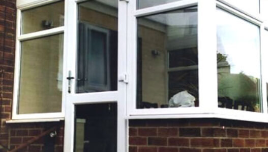 A uPVC porch on top of a brick base