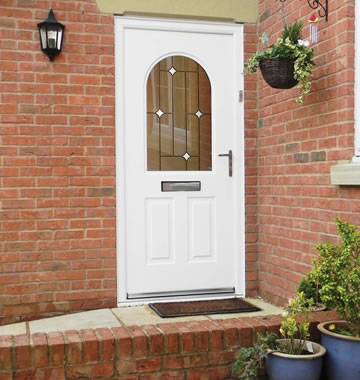 White front door in composite materials with glazed panel