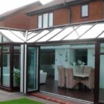rosewood conservatory with bi-folding doors in Yorkshire