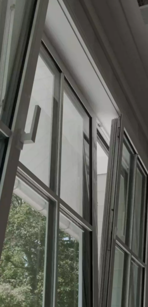 couple-looking-at-the-garden-through-the-window-2023-11-27-05-22-49-utc 1(1)